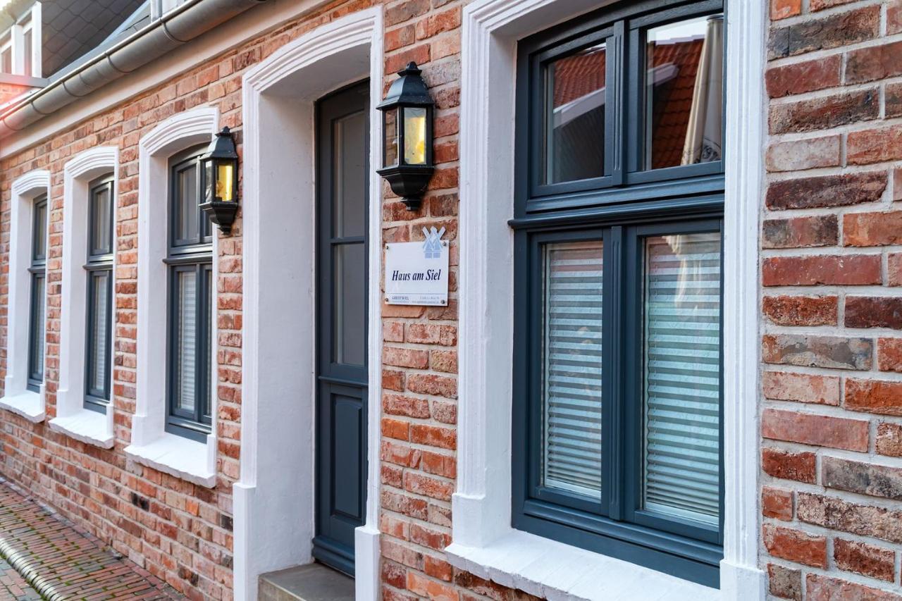 Haus Am Siel 01, Zentral Mit Eigenem Steg Villa Greetsiel Bagian luar foto
